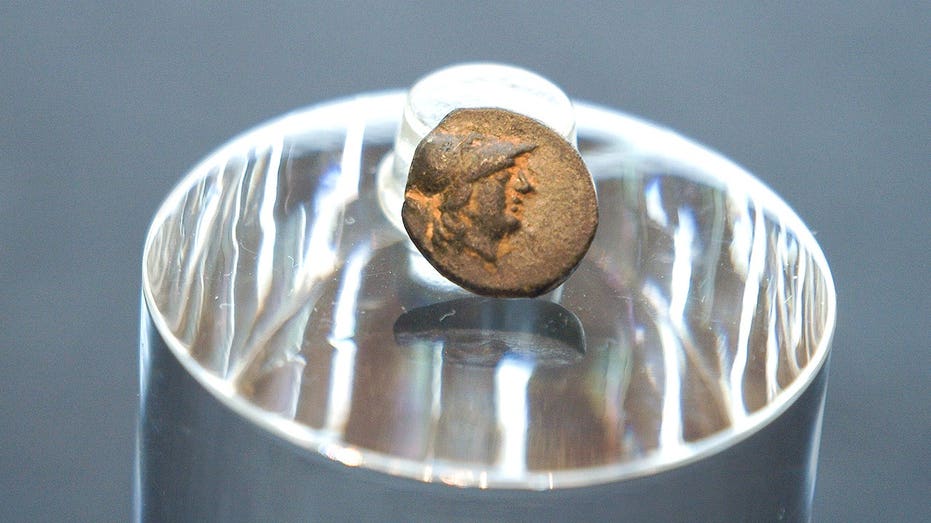 Teen stumbles on mysterious coin from legendary city, puzzling archaeologists over its journey Canberra Private Schools